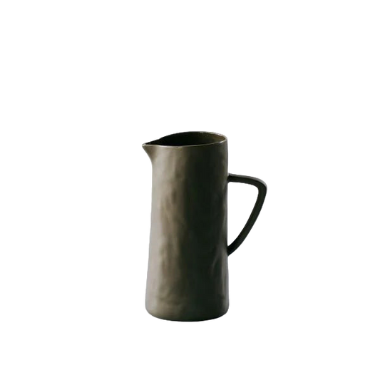 Khaki ceramic pitcher on white background