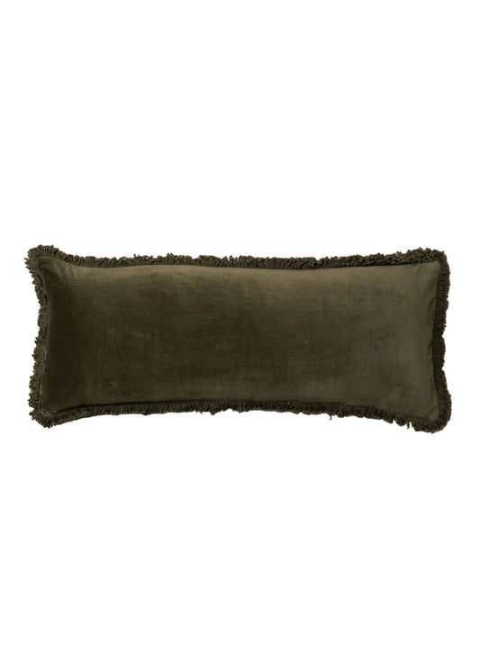 Green pillow with frayed edges on a white background